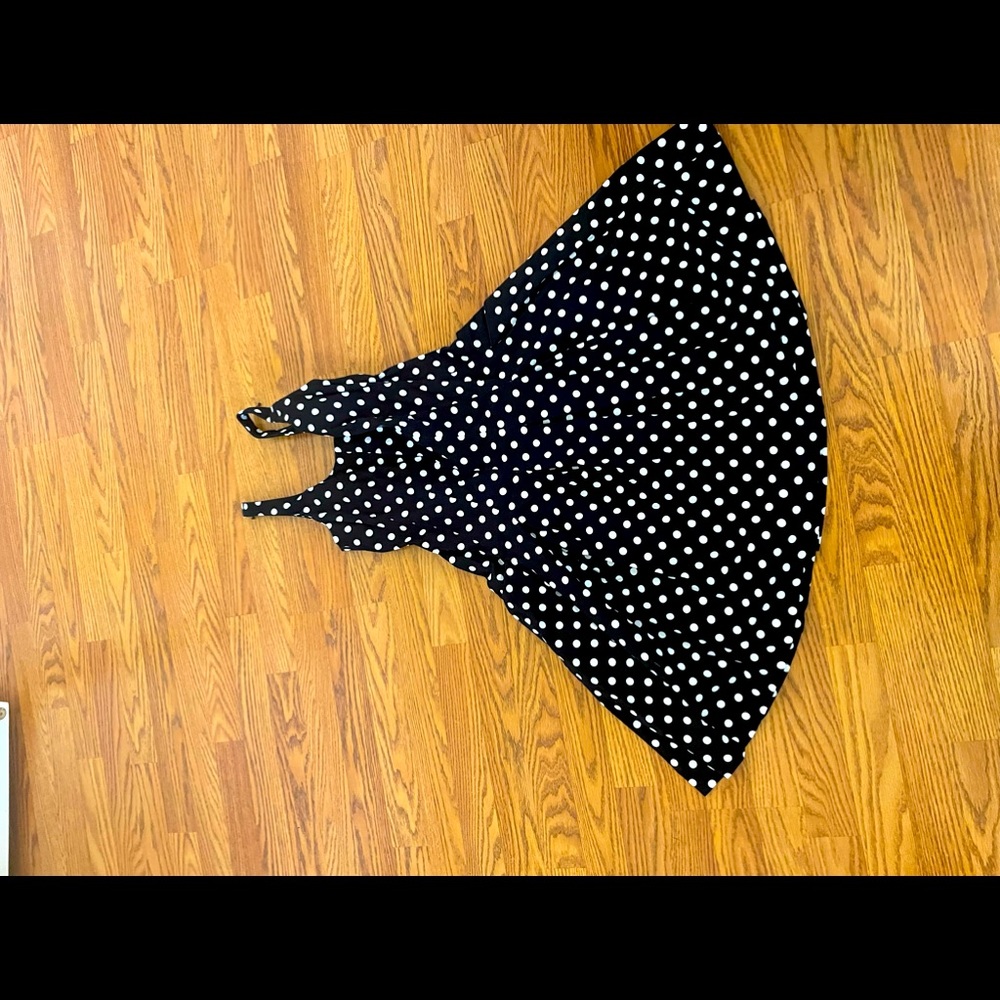 Black/white polka dot vintage dress with pockets. Straps have clips to hold bra.